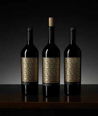 three bottles of 2016 darius ii posed