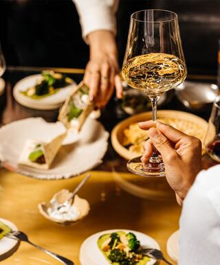 Spoon dishes filled with pistachio soup