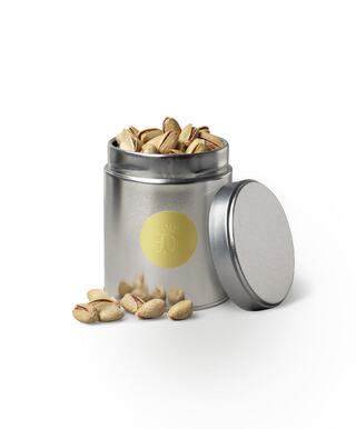 Image of open pistachio tin with pistachios